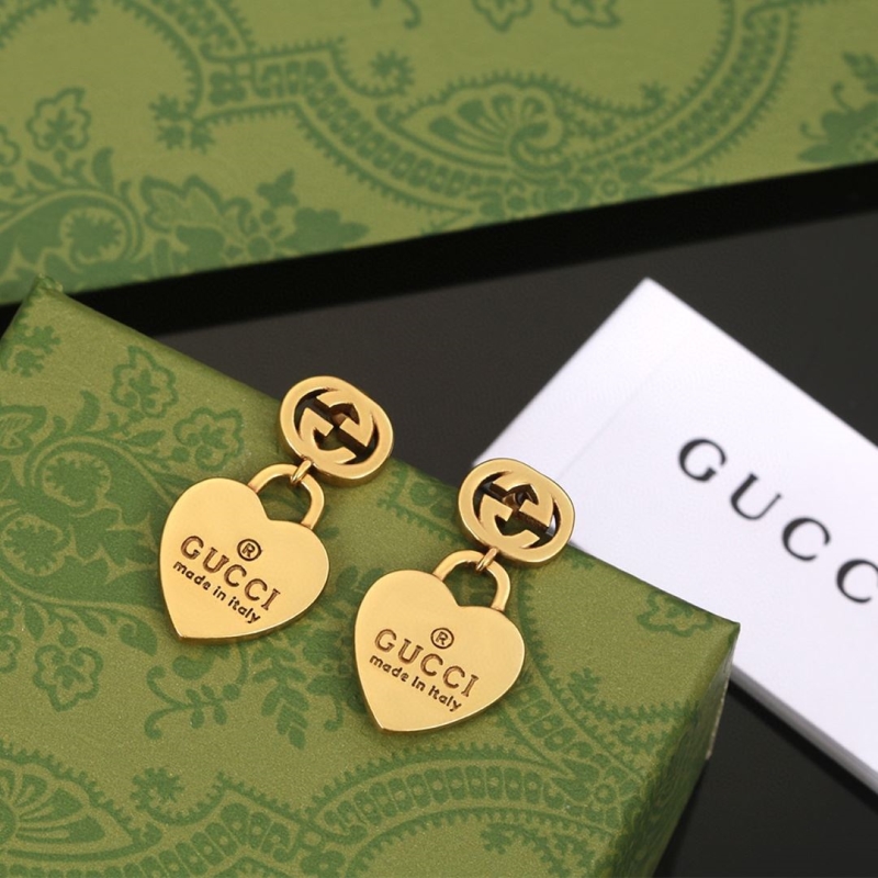 G*u*i earrings